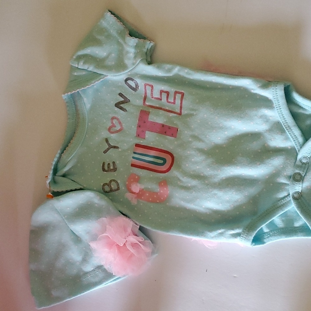 Emporio Baby blue with white polka dots and pink ruffles on the back size 3/6m